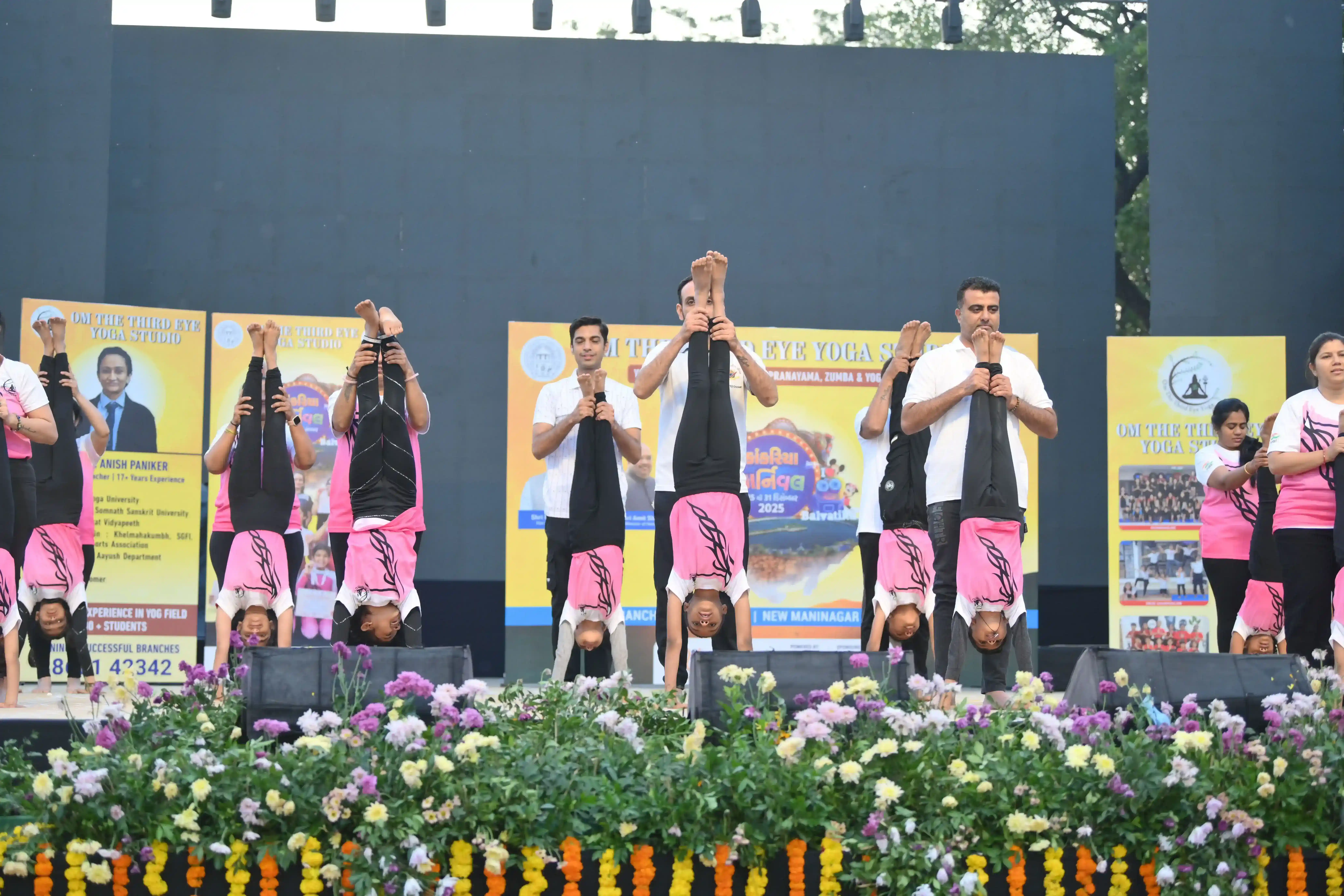 Advanced practitioners showcasing strength and balance at our Ghodasar branch.