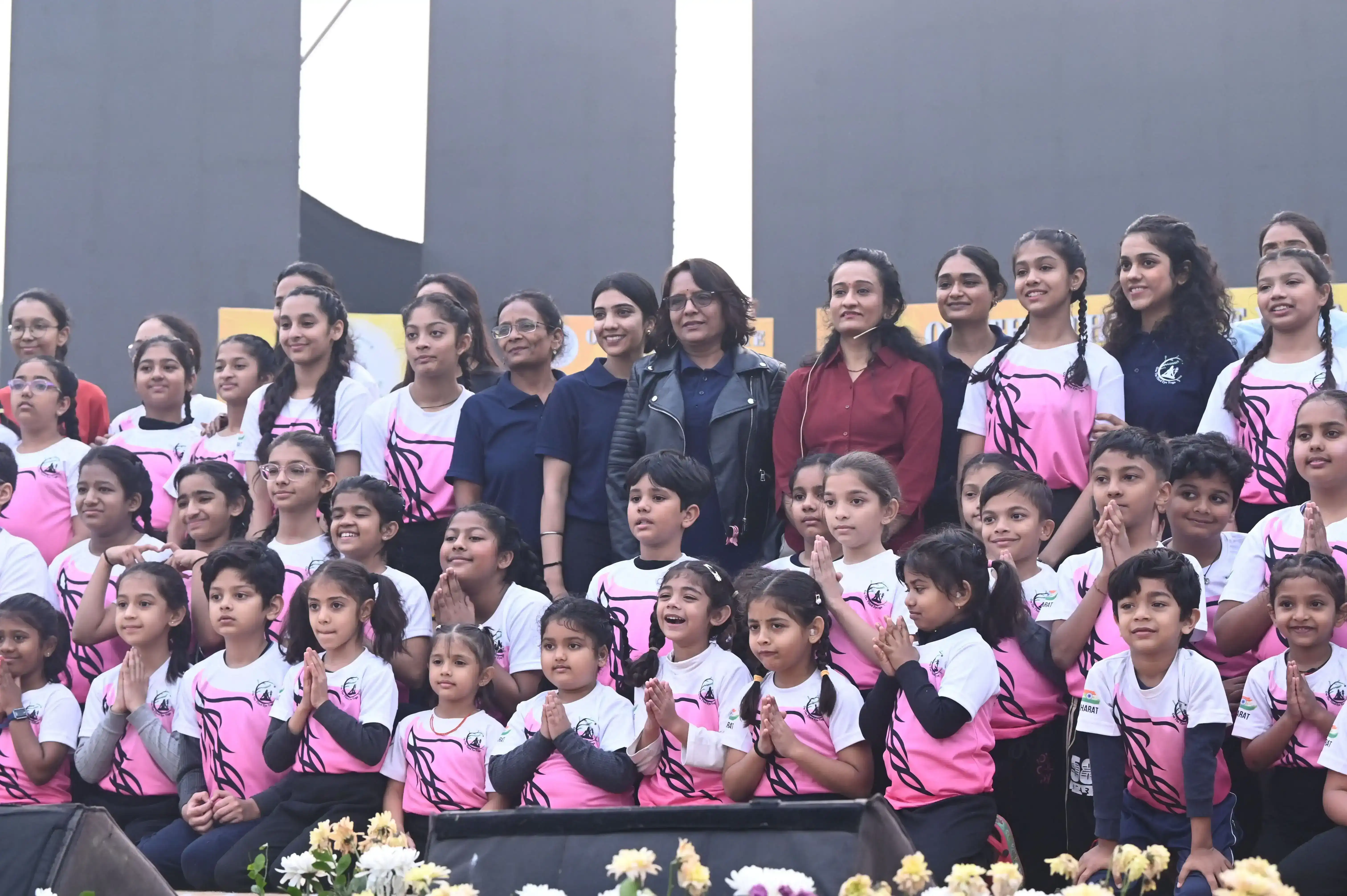 Members of our yoga family gathered for a session at the local sports complex.